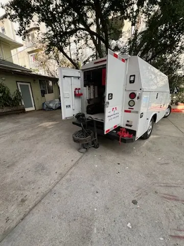 Magnet Plumbing service vehicle on-site for Grease Trap Cleaning in Houses Corner